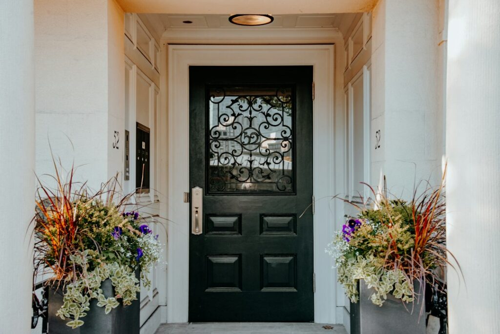 black entry door with glass